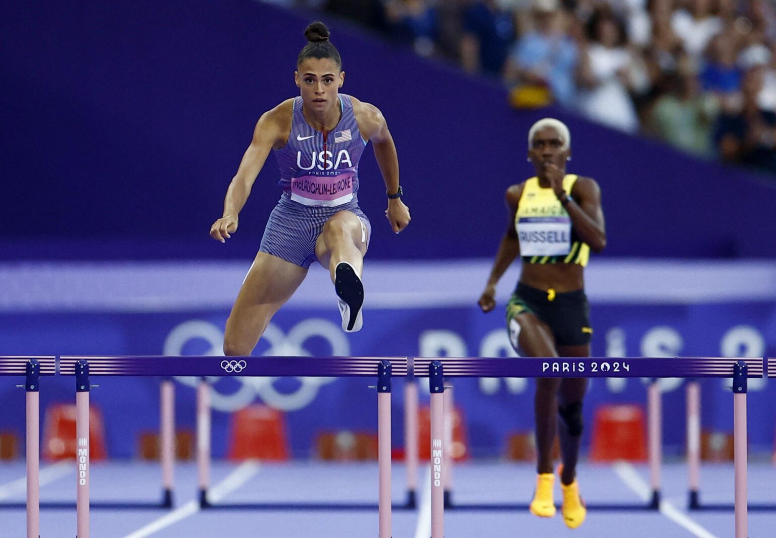 Holloway Dominates to Reach Hurdles Final as Parchment Makes a Surprising Comeback!