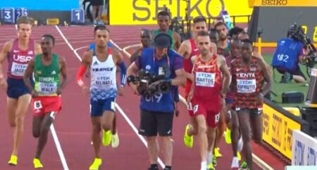 Unbelievable Moment: Oblivious Cameraman Stumbles into Olympic Race!