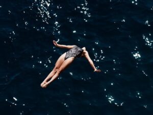 Sprinting to the Top: Unveiling Quality, Distance Variety, and Specialization in Swimmers and Runners